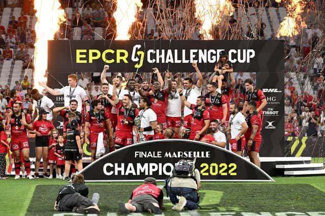 Lyon players celebrate after winning the 2022 European Challenge Cup, beating Toulon in the final in Marseille.  (Photo by PASCAL GUYOT/AFP via Getty Images)