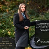 Karla O'Connor at their graveside of her papa John O'Connor who started the family business in 2003