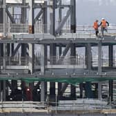Two construction industry bodies have joined calls for the sector to ensure payments are made to hard-pressed businesses on time and prevent a jobs bloodbath. Picture: Jane Barlow/PA Wire
