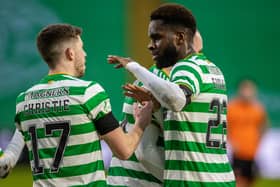 GLASGOW, SCOTLAND - DECEMBER 30: Celtic's Odsonne Edouard (right) celebrates his goal with Ryan Christie during a Scottish Premiership match between Celtic and Dundee United at Celtic Park, on December 30, 2020, in Glasgow, Scotland. (Photo by Craig Williamson / SNS Group)