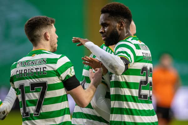 GLASGOW, SCOTLAND - DECEMBER 30: Celtic's Odsonne Edouard (right) celebrates his goal with Ryan Christie during a Scottish Premiership match between Celtic and Dundee United at Celtic Park, on December 30, 2020, in Glasgow, Scotland. (Photo by Craig Williamson / SNS Group)