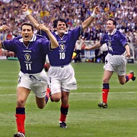 John Collins, with Darren Jackson sharing the jubilation, sets off on a celebration following his penalty equaliser against Brazil in the France 98 opener that he now as certain regrets over.  (Photo credit: Toshifumi  Kitamura /AFP via Getty Images)