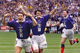 John Collins, with Darren Jackson sharing the jubilation, sets off on a celebration following his penalty equaliser against Brazil in the France 98 opener that he now as certain regrets over.  (Photo credit: Toshifumi  Kitamura /AFP via Getty Images)