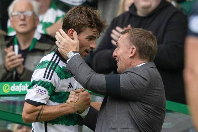 GLASGOW, SCOTLAND - AUGUST 05: Celtic manager Brendan Rodgers and Matt O'Riley during a cinch Premiership match between Celtic and Ross County at Celtic Park, on August 05, 2023, in Glasgow, Scotland. (Photo by Craig Foy / SNS Group)