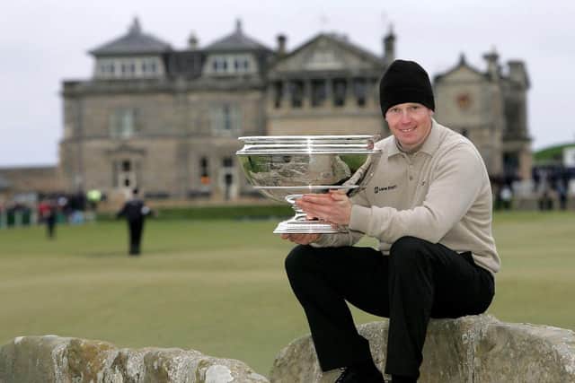 Stephen Gallacher poses with the trophy after winning the 2004 Dunhill Links Championship at St Andrews. Picture: Andrew Redington/Getty Images.