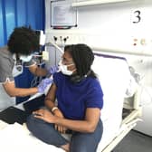 UK equalities minister Kemi Badenoch receives her first vaccination as part of the Novavax phase 3 trial at Guy's and St Thomas' hospital in London, following a call for more volunteers from ethnic minority communities. (Picture: PA)