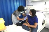 UK equalities minister Kemi Badenoch receives her first vaccination as part of the Novavax phase 3 trial at Guy's and St Thomas' hospital in London, following a call for more volunteers from ethnic minority communities. (Picture: PA)