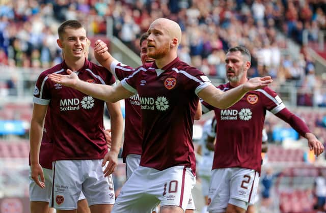 Hearts celebrate after their 3-0 win over Livingston.