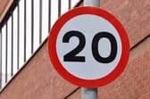 Residents are concerned about the speed of vehicles on the busy road.