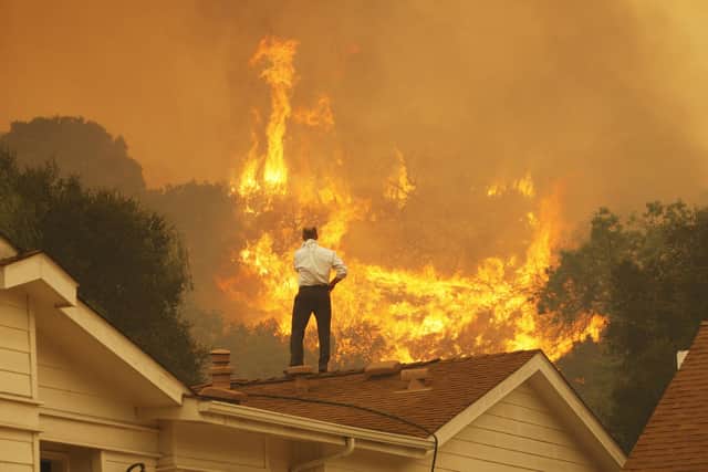 Wildfires are becoming an increasing threat in many parts of the world as the atmosphere heats up (Picture: David McNew/Getty Images)