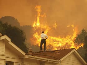 Wildfires are becoming an increasing threat in many parts of the world as the atmosphere heats up (Picture: David McNew/Getty Images)
