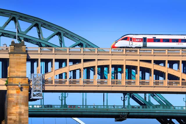 Crossing the River Tyne at Newcastle with views of the 1928 through-arch Tyne Bridge, designed by the firm that would later design the Forth Road Bridge and the 2001 Millennium Bridge, known locally as the 'winking eye'.