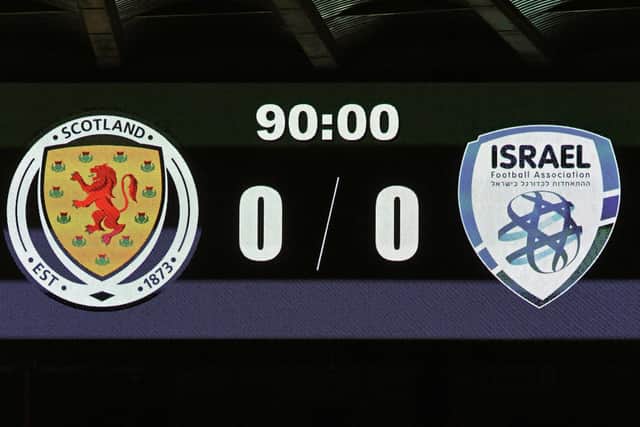 The big screen shows the 0-0 scoreline at full time in the Euro 2020 playoff semi-final football match between Scotland and Israel at Hampden Park, Glasgow on October 8, 2020. (Photo by ANDY BUCHANAN / AFP) (Photo by ANDY BUCHANAN/AFP via Getty Images)