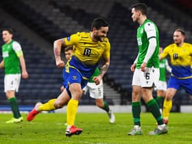 Craig Conway wheels away in celebration after scoring St Johnstone's final goal in their 3-0 victory over Hibs in the Betfred Cup semi-final. Photo by Ross MacDonald/SNS Group