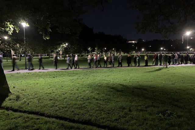 Handout photo of people in Edinburgh queueing to pay their respects to the Queen as she lies in state at St Giles' Cathedral. Picture date: Tuesday September 13, 2022.