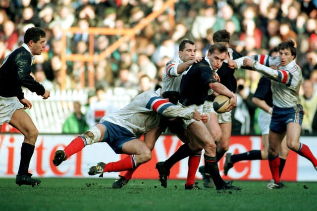 Gregor Townsend conjures up a moment of magic to play in Gavin Hastings, left, for the match-winning try against France at the Parc des Princes in 1995. The move, christened the Toony Flip, began when Scotland ran a late penalty from halfway. Craig Chalmers, the Scotland stand-off, passed to Townsend, who was at outside centre. He fed Hastings who powered his way to the line to tie the scores at 21-21. The full-back then converted his own try for a famous victory.