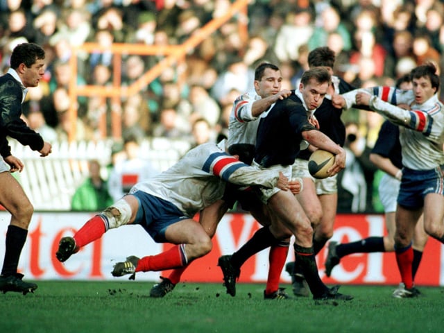 Gregor Townsend conjures up a moment of magic to play in Gavin Hastings, left, for the match-winning try against France at the Parc des Princes in 1995. The move, christened the Toony Flip, began when Scotland ran a late penalty from halfway. Craig Chalmers, the Scotland stand-off, passed to Townsend, who was at outside centre. He fed Hastings who powered his way to the line to tie the scores at 21-21. The full-back then converted his own try for a famous victory.