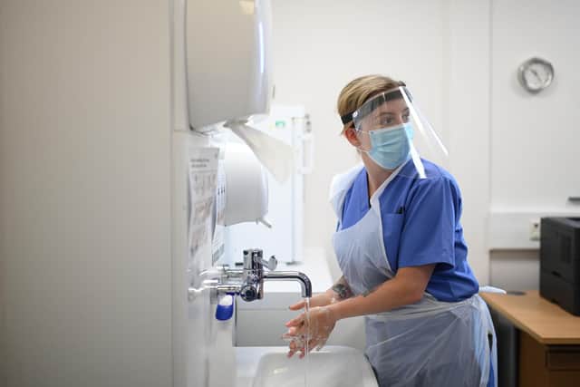 A nurse washes her hands at work. Picture: Getty