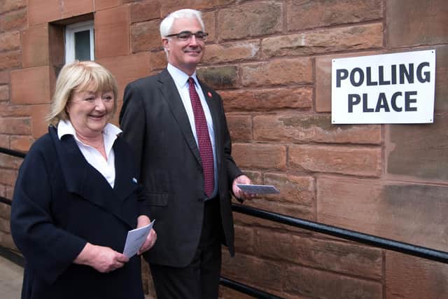 Alistair Darling and his wife Maggie arrive at a polling station in Edinburgh to vote in the 2014 independence referendum (Picture: Stefan Rousseau/pool/AFP via Getty Images)