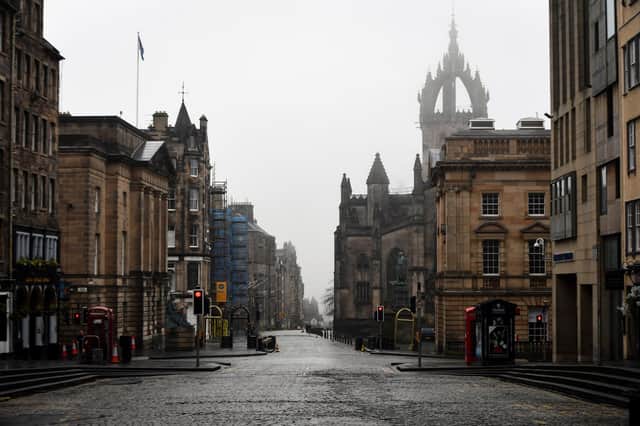 The streets of Edinburgh were deserted during the first lockdown last year (Picture: Andy Buchanan)