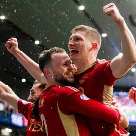 Aberdeen's Jack Mckenzie celebrates after scoring to make it 3-1 over Rangers at Ibrox. (Photo by Sammy Turner / SNS Group)