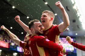 Aberdeen's Jack Mckenzie celebrates after scoring to make it 3-1 over Rangers at Ibrox. (Photo by Sammy Turner / SNS Group)