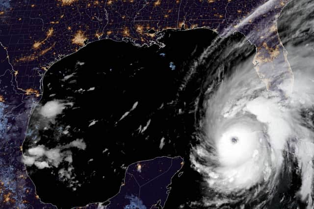 This satellite image shows tropical Hurricane Ian over Cuba, where the tropical storm made landfall in on 27 September -- prompting mass evacuations and fears it will bring widespread destruction as it heads for the US state of Florida. Picture: NOAA/GOES/AFP via Getty Images