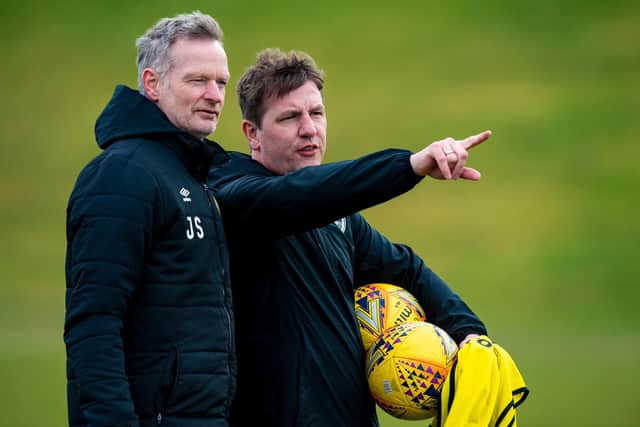 Daniel Stendel and No.2 Jorg Sievers discuss tactics during a training session at the Oriam