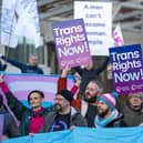 Members of the Scottish Family Party protest alongside supporters of the Gender Recognition Reform Bill (Scotland) outside the Scottish Parliament