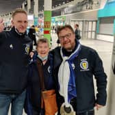 Moira Brown (centre) with fellow Scotland fans Alistair Firth and James Lall