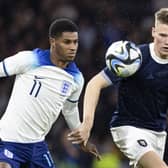 England's Marcus Rashford (L) and Scotland's Scott McTominay in action during the 150th Anniversary Heritage Match at Hampden Park. (Photo by Ross MacDonald / SNS Group)