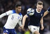 England's Marcus Rashford (L) and Scotland's Scott McTominay in action during the 150th Anniversary Heritage Match at Hampden Park. (Photo by Ross MacDonald / SNS Group)