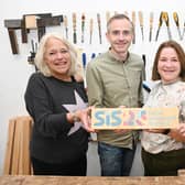 L to R: Helene van der Ploeg, chief executive of Grassmarket Community Project, an a SIS customer; Jon Slight, woodwork manager; Lindsay Wake, head of impact and communications, Social Investment Scotland; Catherine Jones, social enterprise director, at Grassmarket Community Project. Picture by Greg Macvean Photography