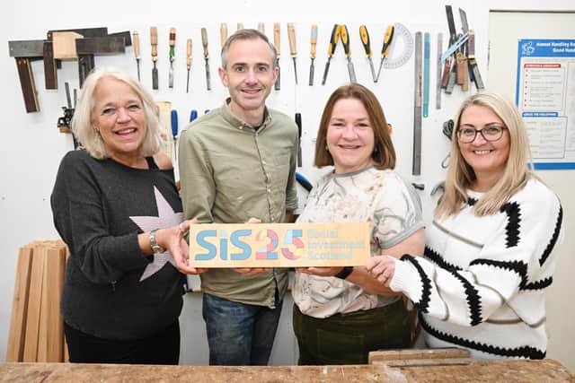 L to R: Helene van der Ploeg, chief executive of Grassmarket Community Project, an a SIS customer; Jon Slight, woodwork manager; Lindsay Wake, head of impact and communications, Social Investment Scotland; Catherine Jones, social enterprise director, at Grassmarket Community Project. Picture by Greg Macvean Photography