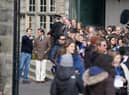 Ed McVey, playing the part of Prince William and Dominic West playing the part of Prince of Wales as they film scenes for the next season of The Crown in St Andrews, Scotland.