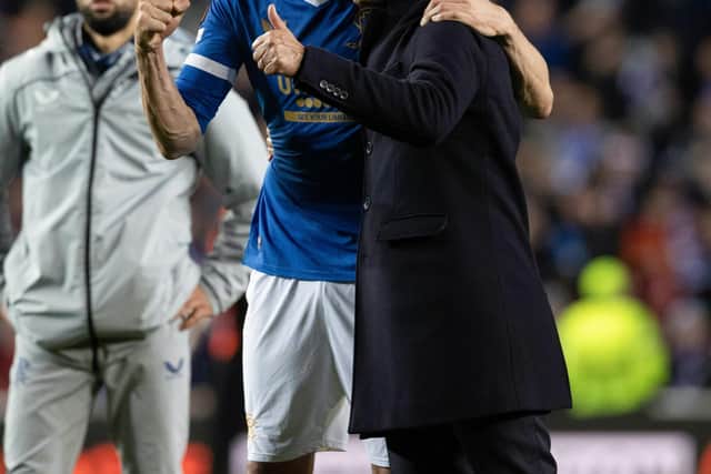Rangers' Leon Balogun (L) and manager Giovanni van Bronckhorst at full time in the semi-final win over Red Bull Leipzig. (Photo by Alan Harvey / SNS Group)
