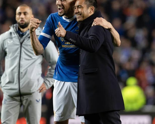 Rangers' Leon Balogun (L) and manager Giovanni van Bronckhorst at full time in the semi-final win over Red Bull Leipzig. (Photo by Alan Harvey / SNS Group)