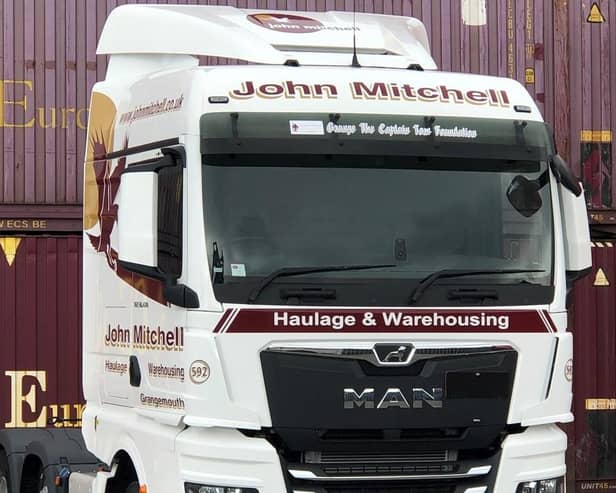 John Mitchell Haulage and Warehousing in Grangemouth has named its latest fleet addition after Captain Sir Tom Moore.