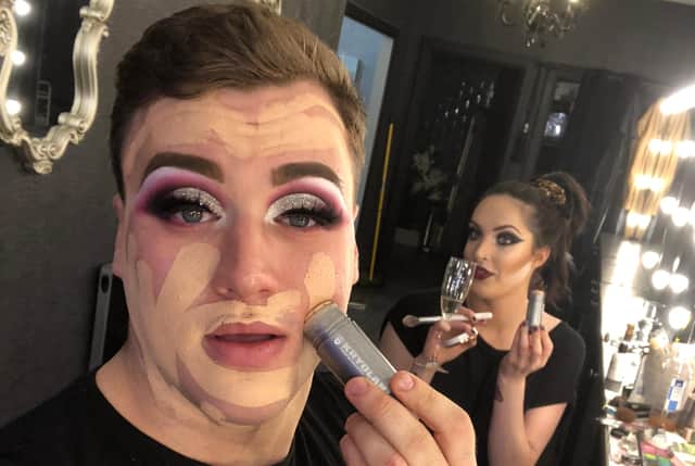 Jamie Grandison transforms into Blaze as Alannah Carson prepares in the background