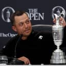 Xander Schauffele touches the Claret Jug during a press conference after winning the 152nd Open at Royal Troon. Picture: Kevin C. Cox/Getty Images.