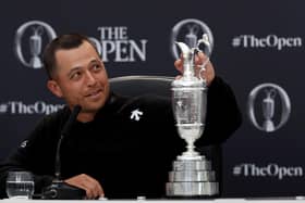 Xander Schauffele touches the Claret Jug during a press conference after winning the 152nd Open at Royal Troon. Picture: Kevin C. Cox/Getty Images.