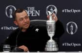 Xander Schauffele touches the Claret Jug during a press conference after winning the 152nd Open at Royal Troon. Picture: Kevin C. Cox/Getty Images.