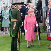 The Queen during a garden party at the Palace of Holyroodhouse h in 2019 (Jane Barlow/PA)