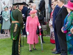 The Queen during a garden party at the Palace of Holyroodhouse h in 2019 (Jane Barlow/PA)