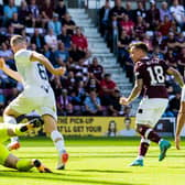 Barrie McKay scores to make it 2-0 to Hearts as the Tynecastle side defeat Ross County on opening day. Picture: SNS