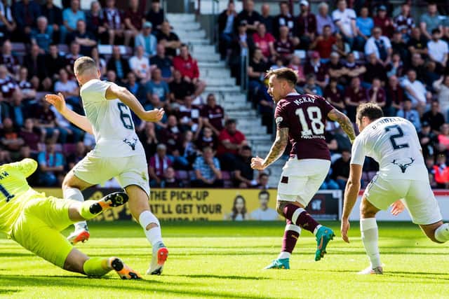 Barrie McKay scores to make it 2-0 to Hearts as the Tynecastle side defeat Ross County on opening day. Picture: SNS