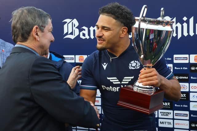 Sione Tuipulotu receives the trophy after Scotland's 52-11 win over Chile at the Estadio Nacional in Santiago. (Photo by Marcelo Hernandez/Getty Images for Scottish Rugby)
