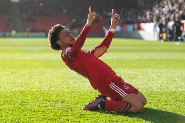 Vicente Besuijen celebrates after scoring to make it 3-1 to Aberdeen.