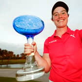 Leona Maguire of Ireland imitates a "selfie" as she poses with the trophy after winning the LPGA Drive On Championship at Crown Colony Golf & Country Club, Florida. (Photo by Douglas P. DeFelice/Getty Images)