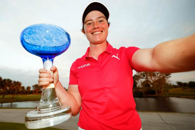 Leona Maguire of Ireland imitates a "selfie" as she poses with the trophy after winning the LPGA Drive On Championship at Crown Colony Golf & Country Club, Florida. (Photo by Douglas P. DeFelice/Getty Images)